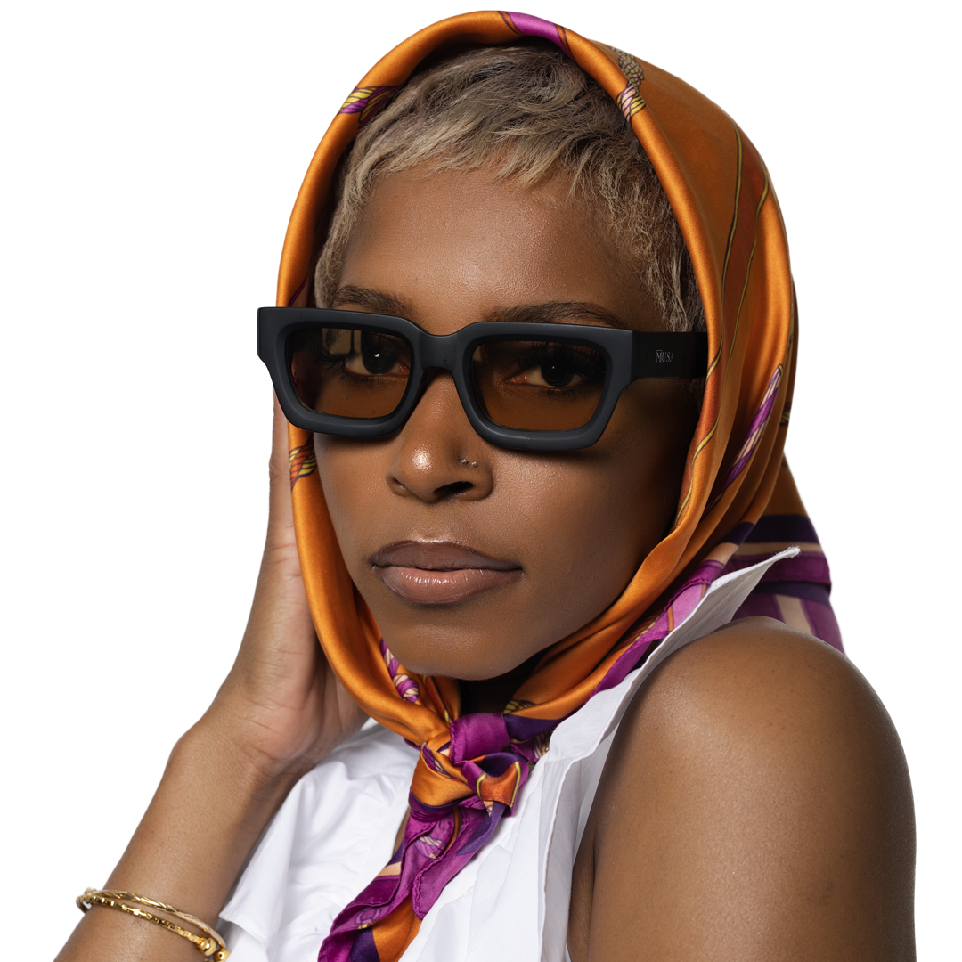 Model wearing Cameroon sunglasses with brown tint lenses