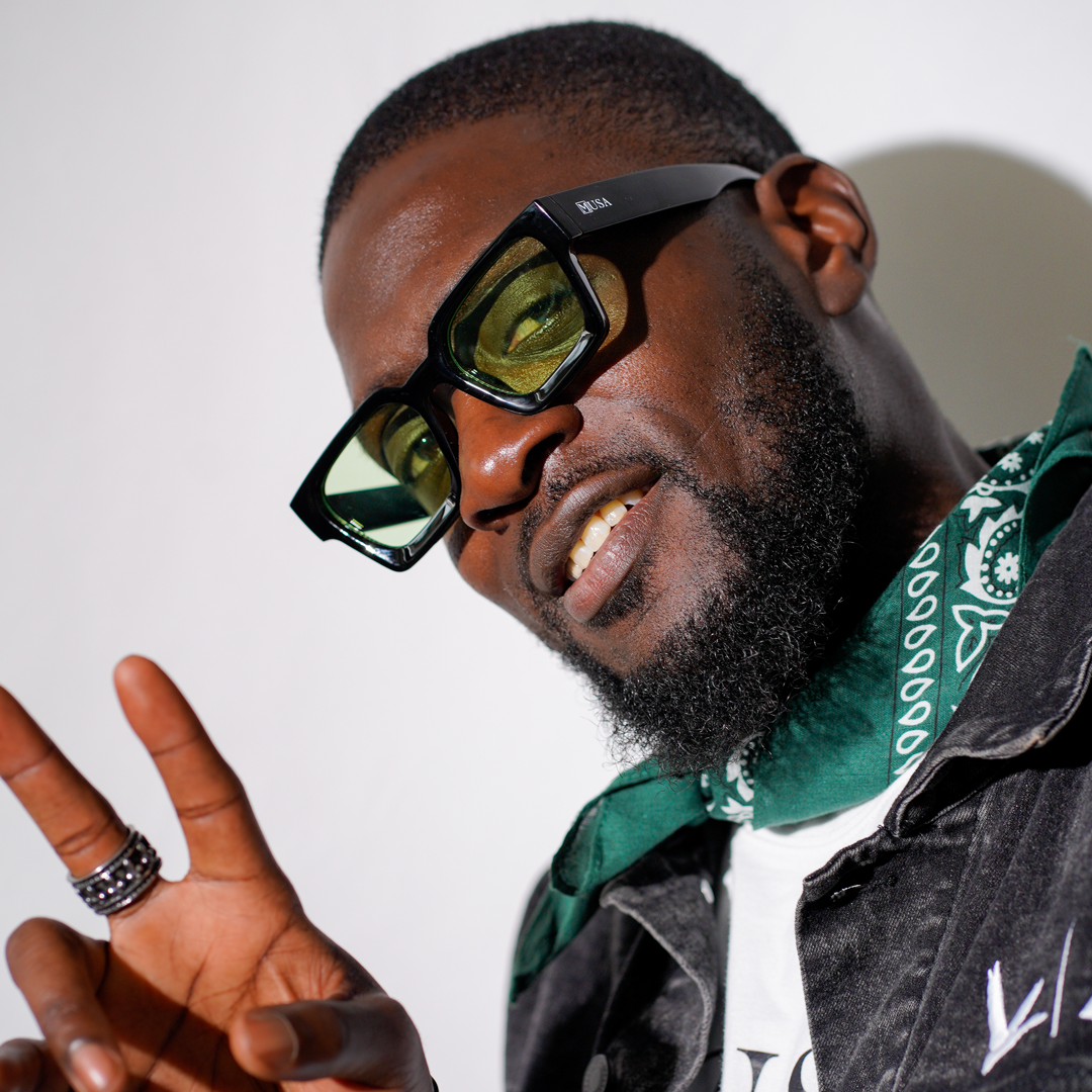 Model wearing Nigeria sunglasses