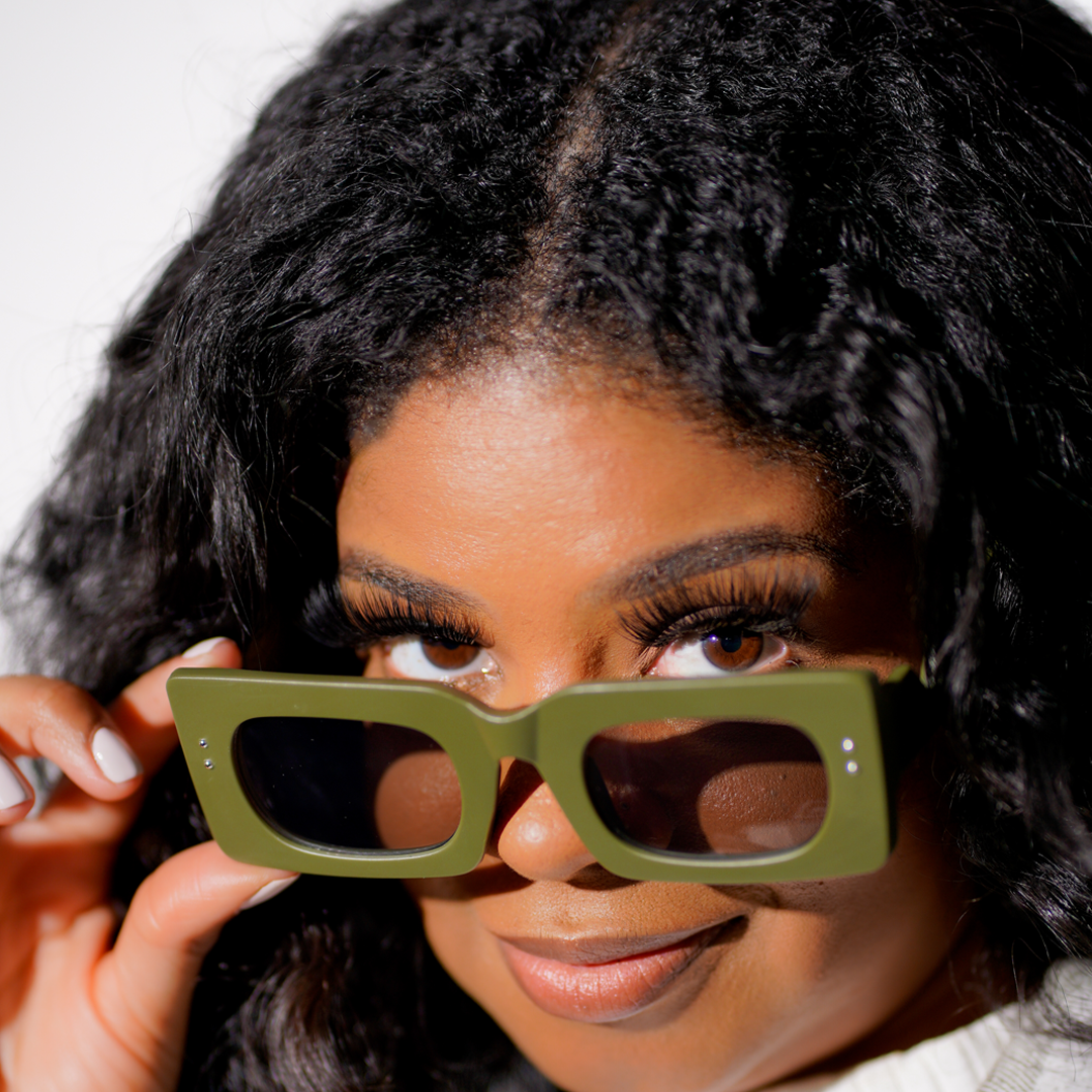Model wearing Sierra Leone sunglasses